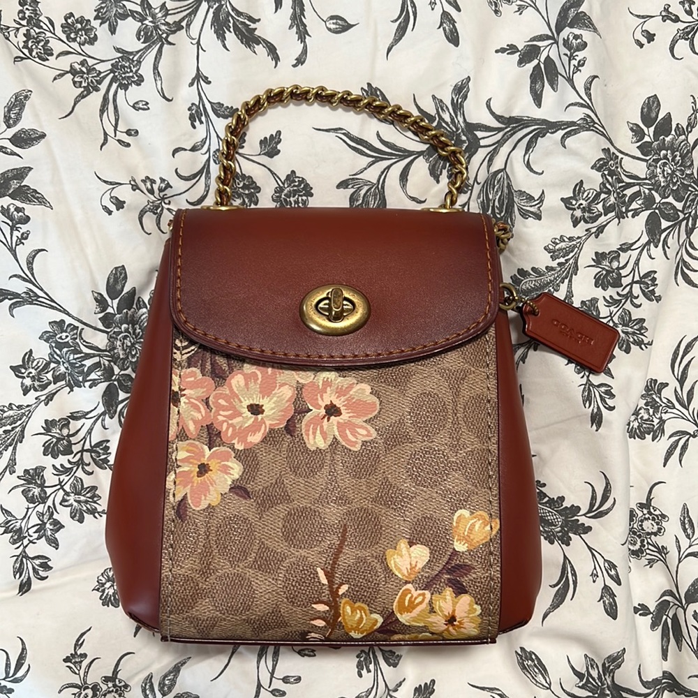 Coach mini monogram flower backpack
